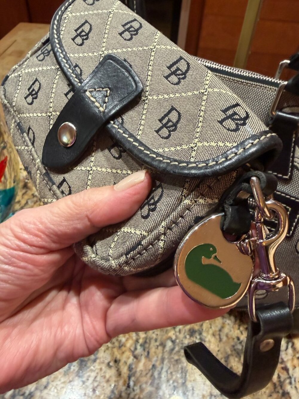 DOONEY & BOURKE TAN CANVAS BLACK LEATHER TRIM BUCKLE WRISTLET WITH GREEN DUCK